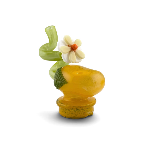 The Waffle Glass Mango Dry Puffco Peak Attachment features a fun mango shaped design with a straw style mouthpiece